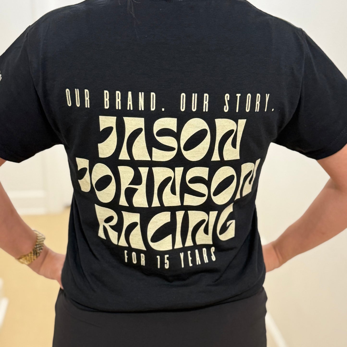 Our Brand. Our Story. T-Shirt (Black)
